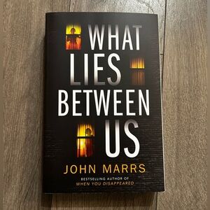 What Lies Between Us by John Marrs